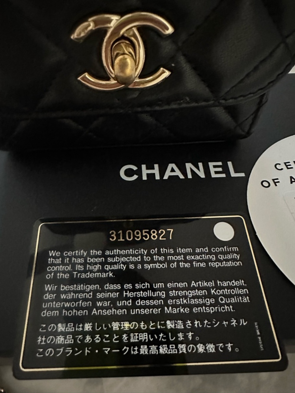 CHANEL Black Quilted Lambskin Mini Crossbody with Gold Chain - Picture 7 of 12